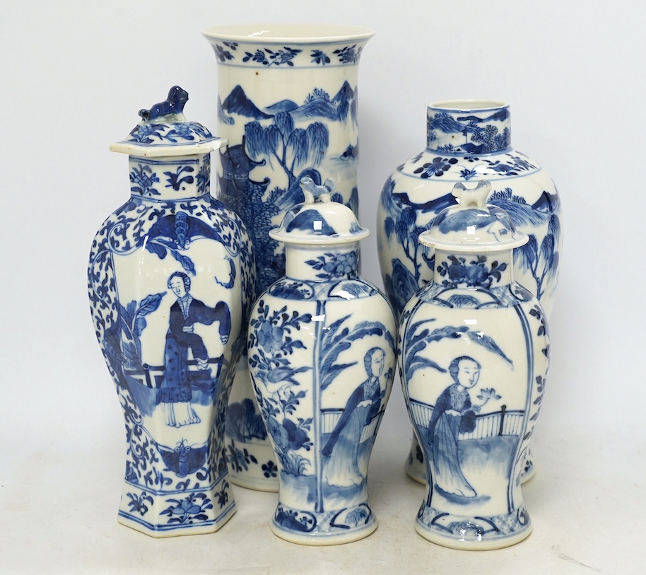 Five blue and white Chinese export porcelain vases, tallest 30cm high. Condition - one cover on a vase is chipped another cover (on pair of vases) is chipped, the three other vases are good